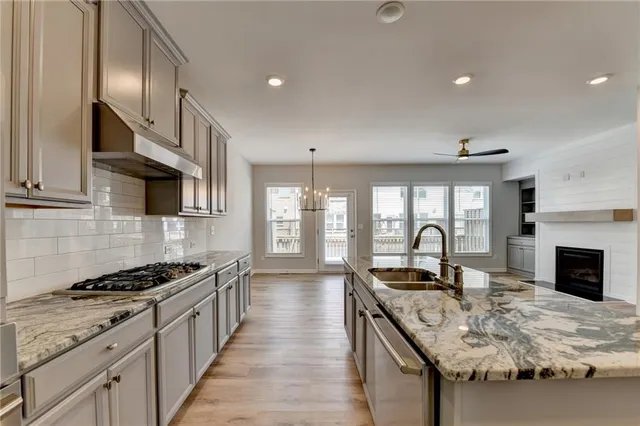a bathroom with a sink and mirror