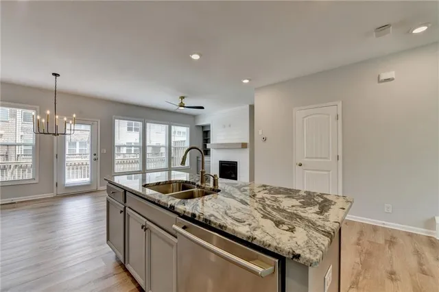 a view of staircase with white walls and windows