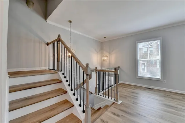 a bathroom with a sink a mirror and a shower