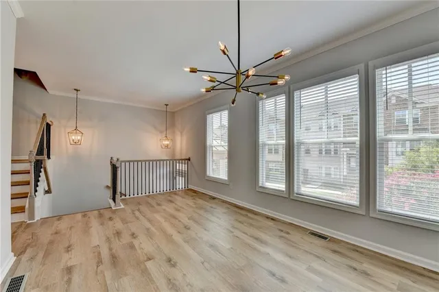 a view of entryway with wooden floor
