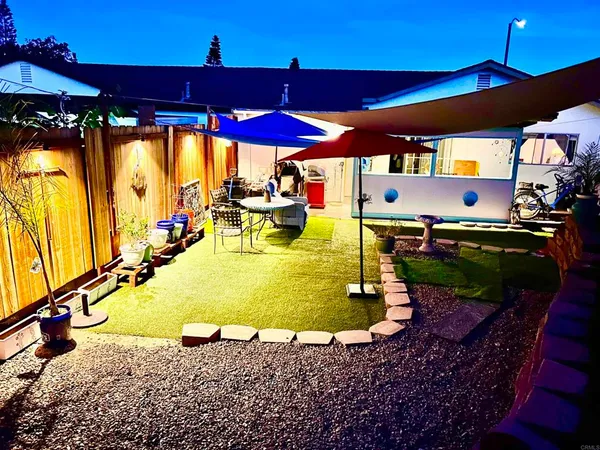 a view of a swimming pool with a patio