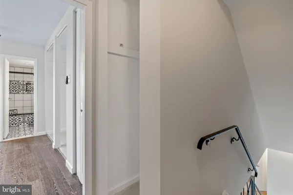 a view of a bathroom from a hallway