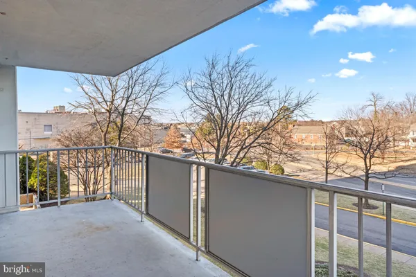 a view of a house with a snow in the yard