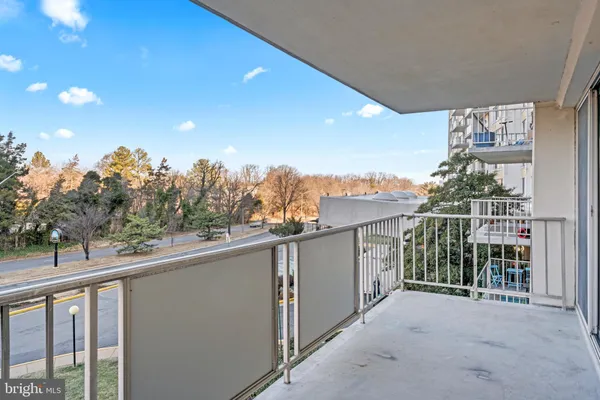 a view of a balcony with city view