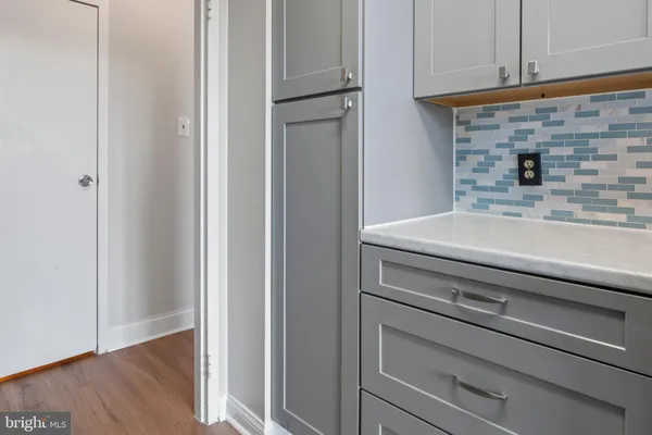 a close view of a sink and dishwasher in a kitchen