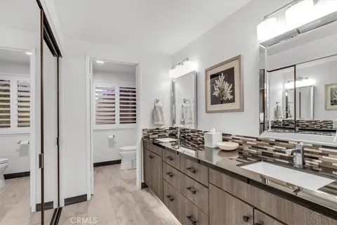 a kitchen with stainless steel appliances a stove and a refrigerator