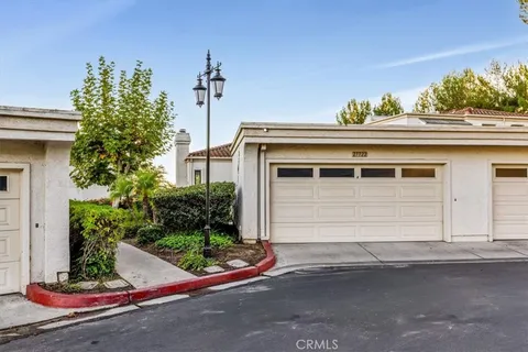 a front view of a house with a garage