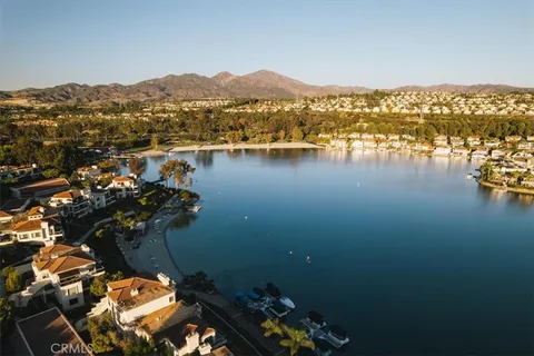 a view of an ocean with a mountain