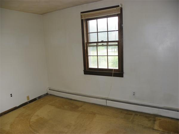 91 Nashua Road Pepperell, MA 01463 - Photo 11 of 14 an empty room with a window
