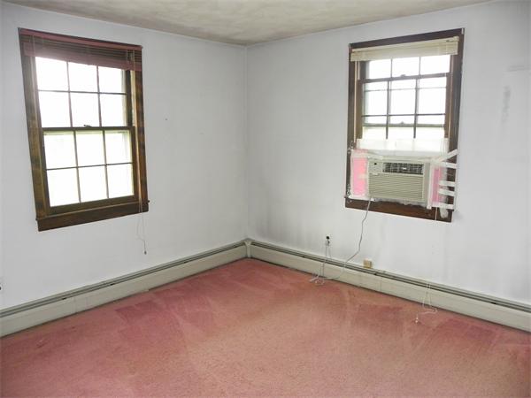 91 Nashua Road Pepperell, MA 01463 - Photo 13 of 14 an empty room with a window