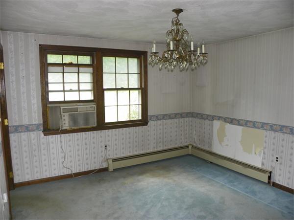 91 Nashua Road Pepperell, MA 01463 - Photo 7 of 14 a view of an empty room with a window