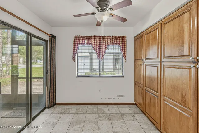 a bathroom with a mirror sink and tub