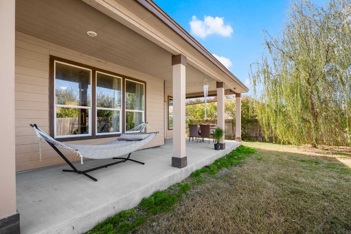 101 Kavanaugh Street Georgetown, TX 78628 - Photo 25 of 32 a swimming pool with outdoor seating and yard
