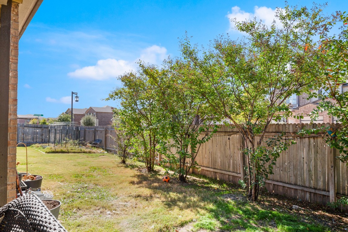 101 Kavanaugh Street Georgetown, TX 78628 - Photo 29 of 32 a view of a backyard