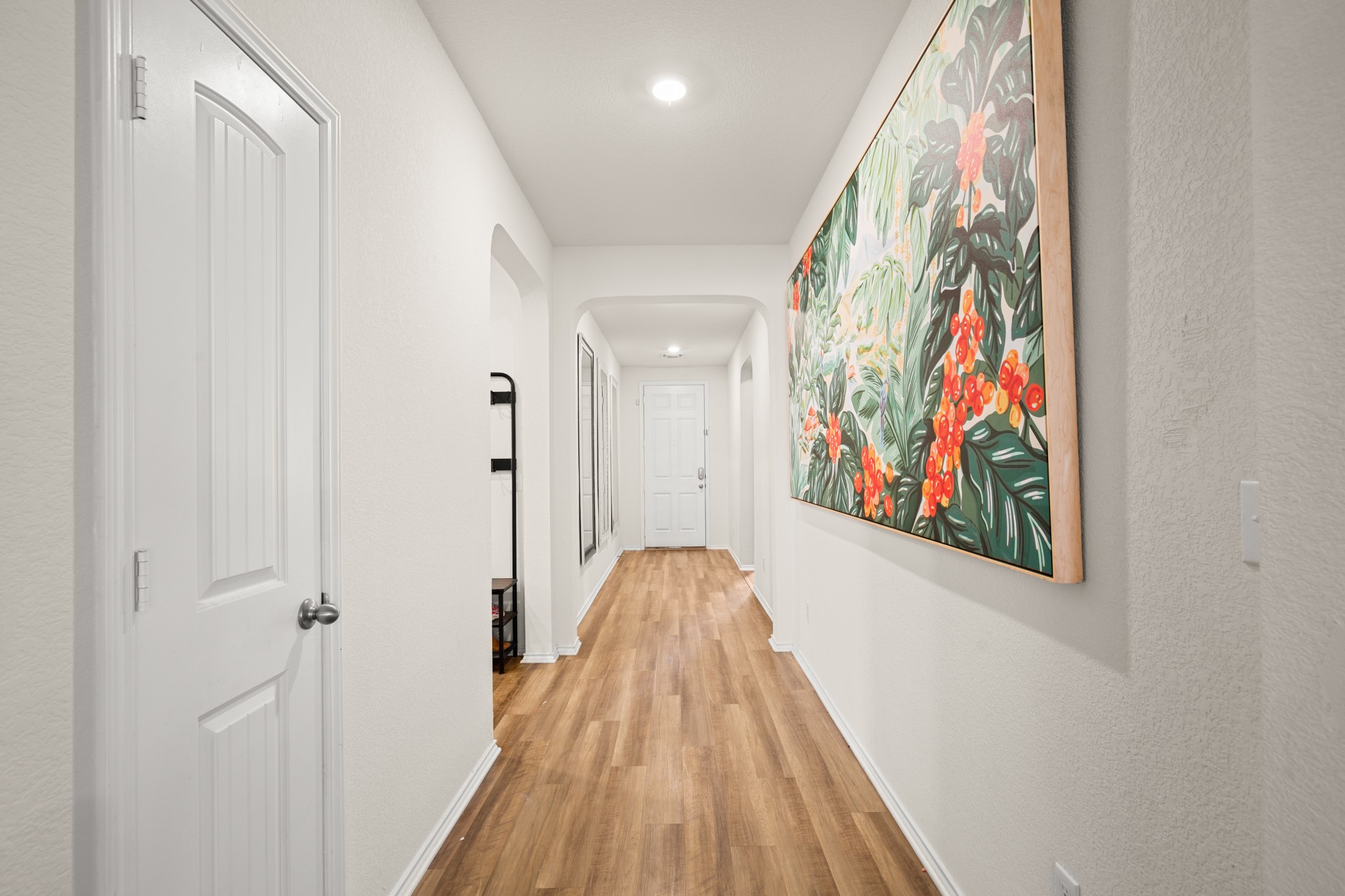 101 Kavanaugh Street Georgetown, TX 78628 - Photo 32 of 32 a view of a hallway with wooden floor and staircase