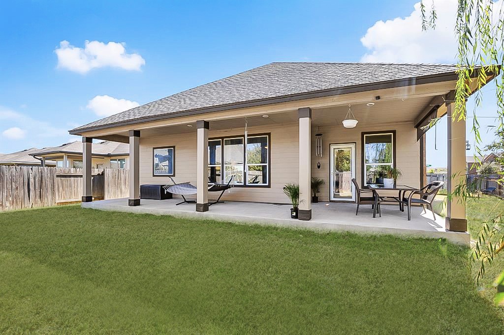 101 Kavanaugh Street Georgetown, TX 78628 - Photo 8 of 32 a view of a house with a backyard and sitting area