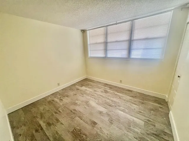 a view of swimming pool yard from a lake