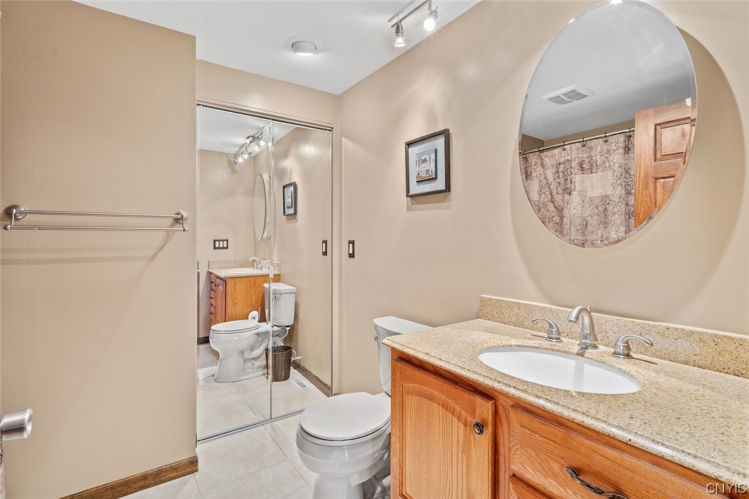 7653 Doubletree Circle Clay, NY 13212 - Photo 17 of 38 full bath w/ laundry