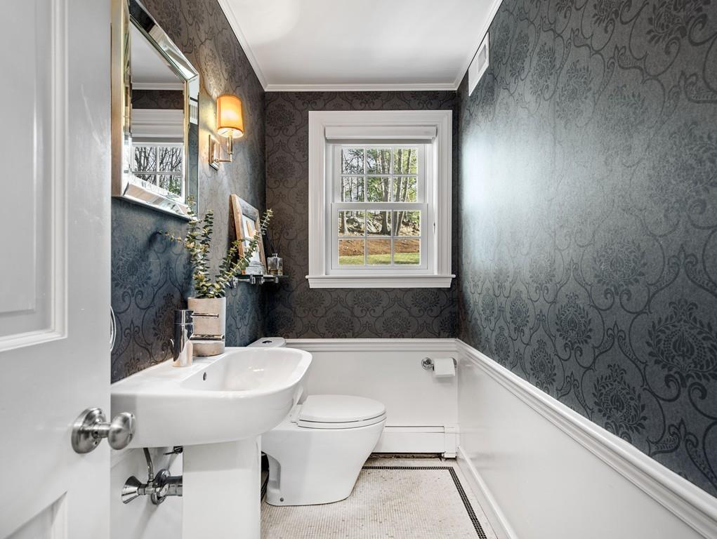119 Hampshire Road Wellesley, MA 02481 - Photo 11 of 19 a bathroom with a sink a toilet and shower