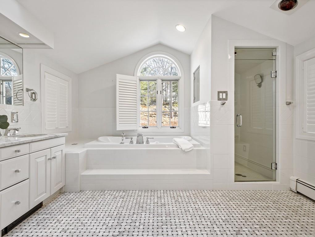 119 Hampshire Road Wellesley, MA 02481 - Photo 14 of 19 a spacious bathroom with a bathtub a sink and a shower