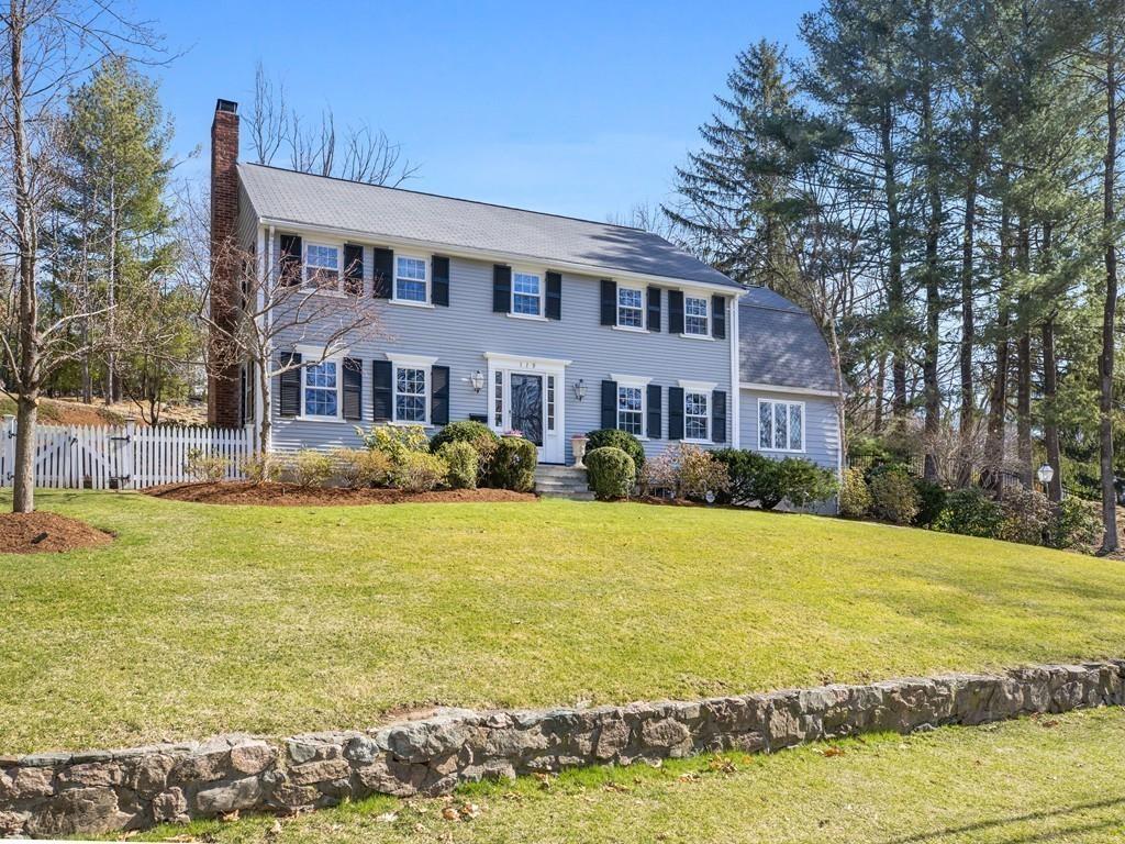 119 Hampshire Road Wellesley, MA 02481 - Photo 19 of 19 a front view of a house with a yard