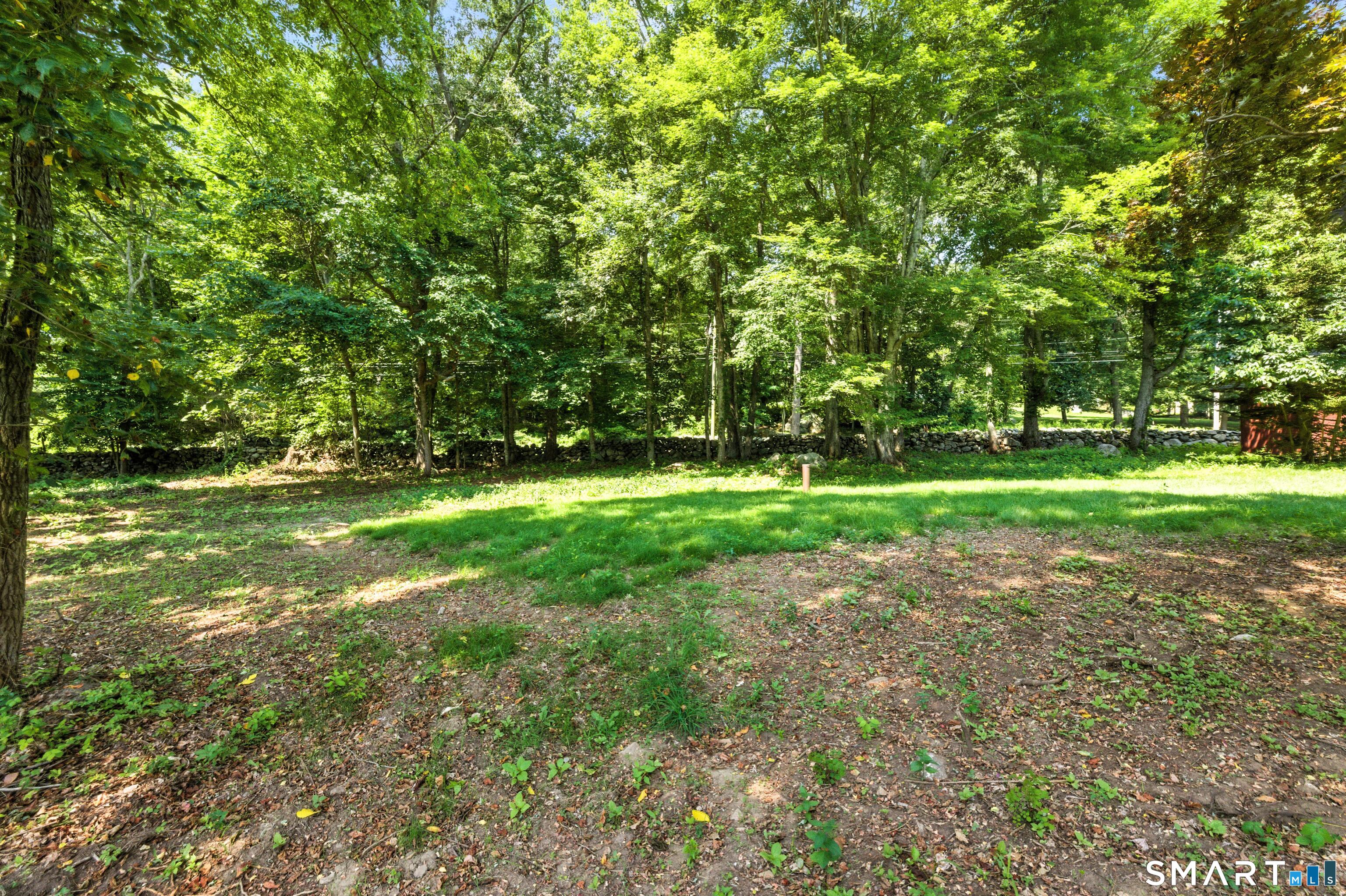 82 Cove Road Stonington, CT 06378 - Photo 13 of 20 a view of a park with large trees