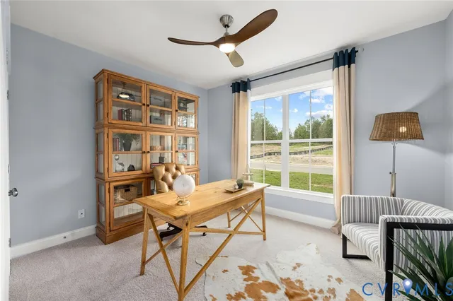 a workspace with furniture and a window