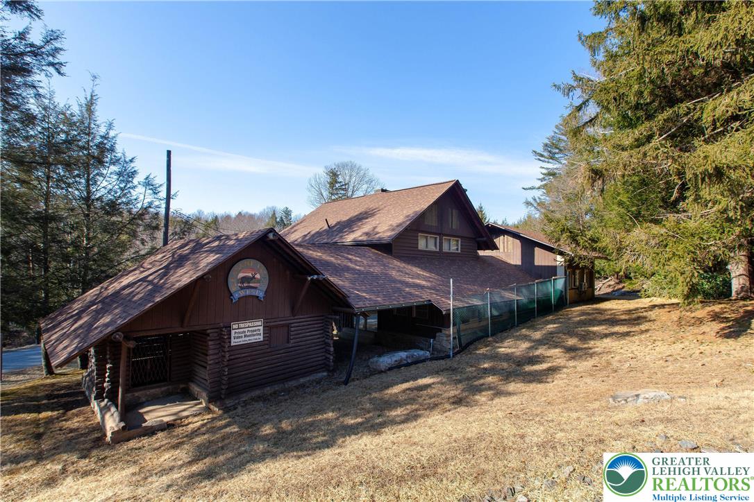 Delware Drive, Unit C281 Jim Thorpe, PA 18229 - Photo 8 of 11 a front view of a house with a yard