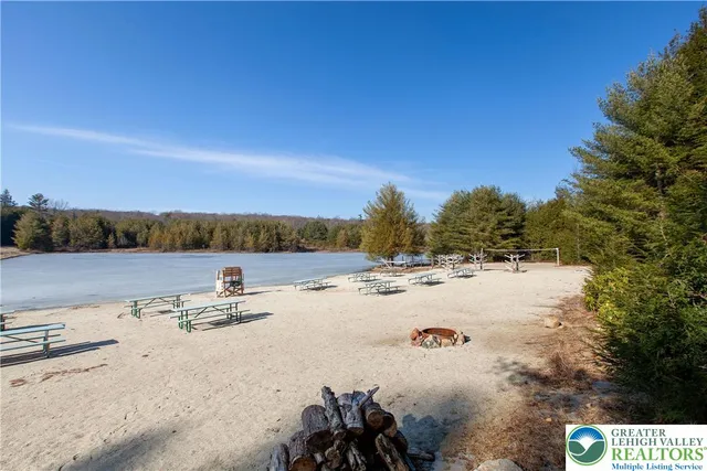 a view of a park with swings and slides