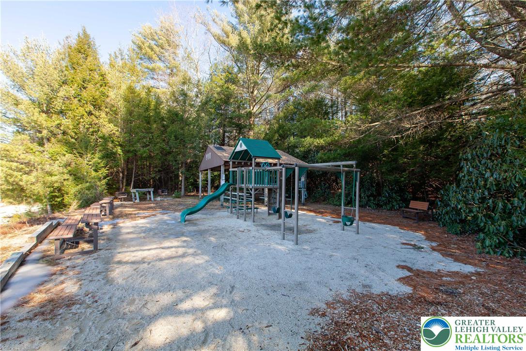 Delware Drive, Unit C281 Jim Thorpe, PA 18229 - Photo 10 of 11 a view of a park with swings and slides