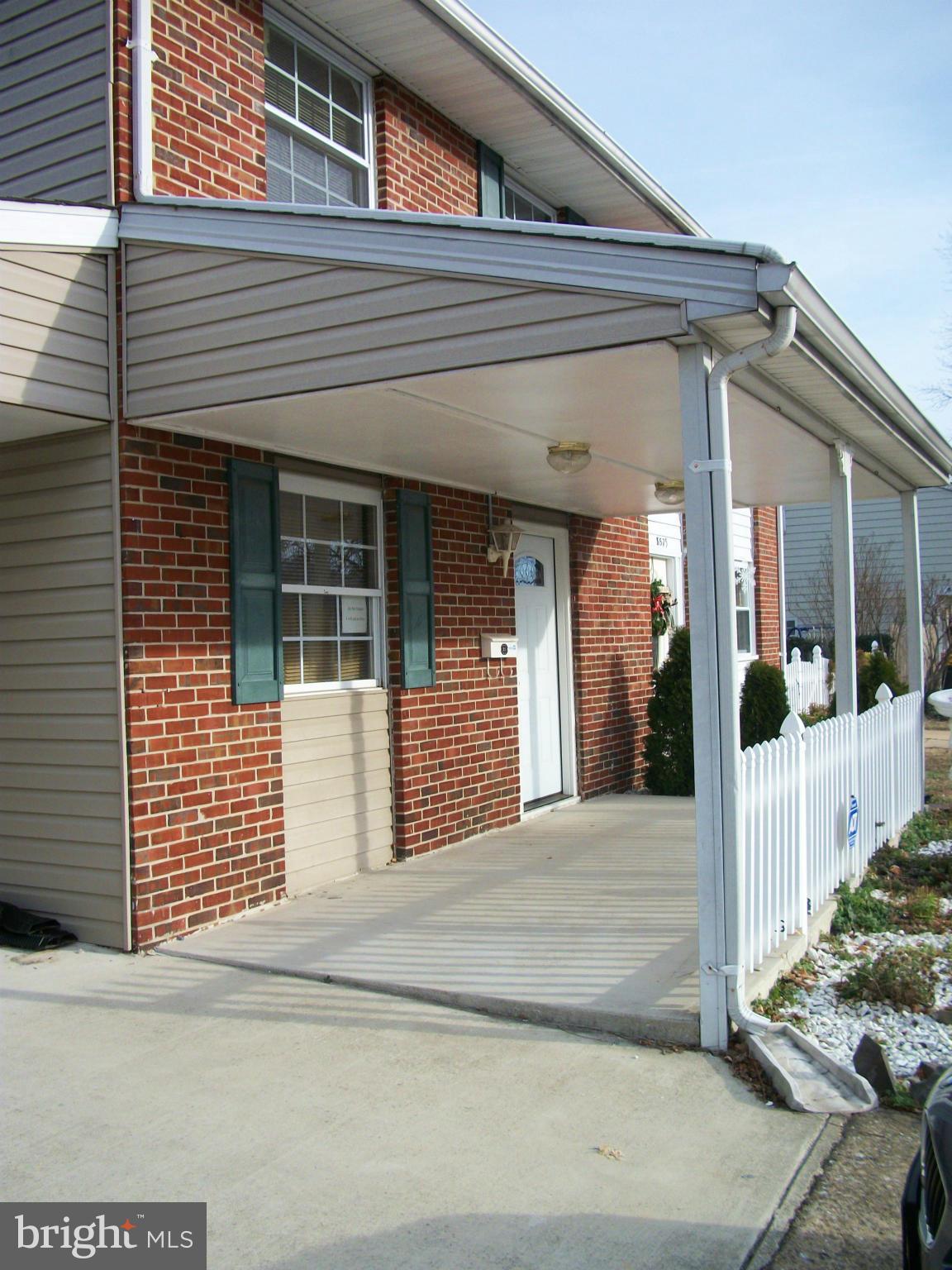 8573 Beacon Point Road Pasadena, MD 21122 - Photo 2 of 8 Large covered porch in water privileged community