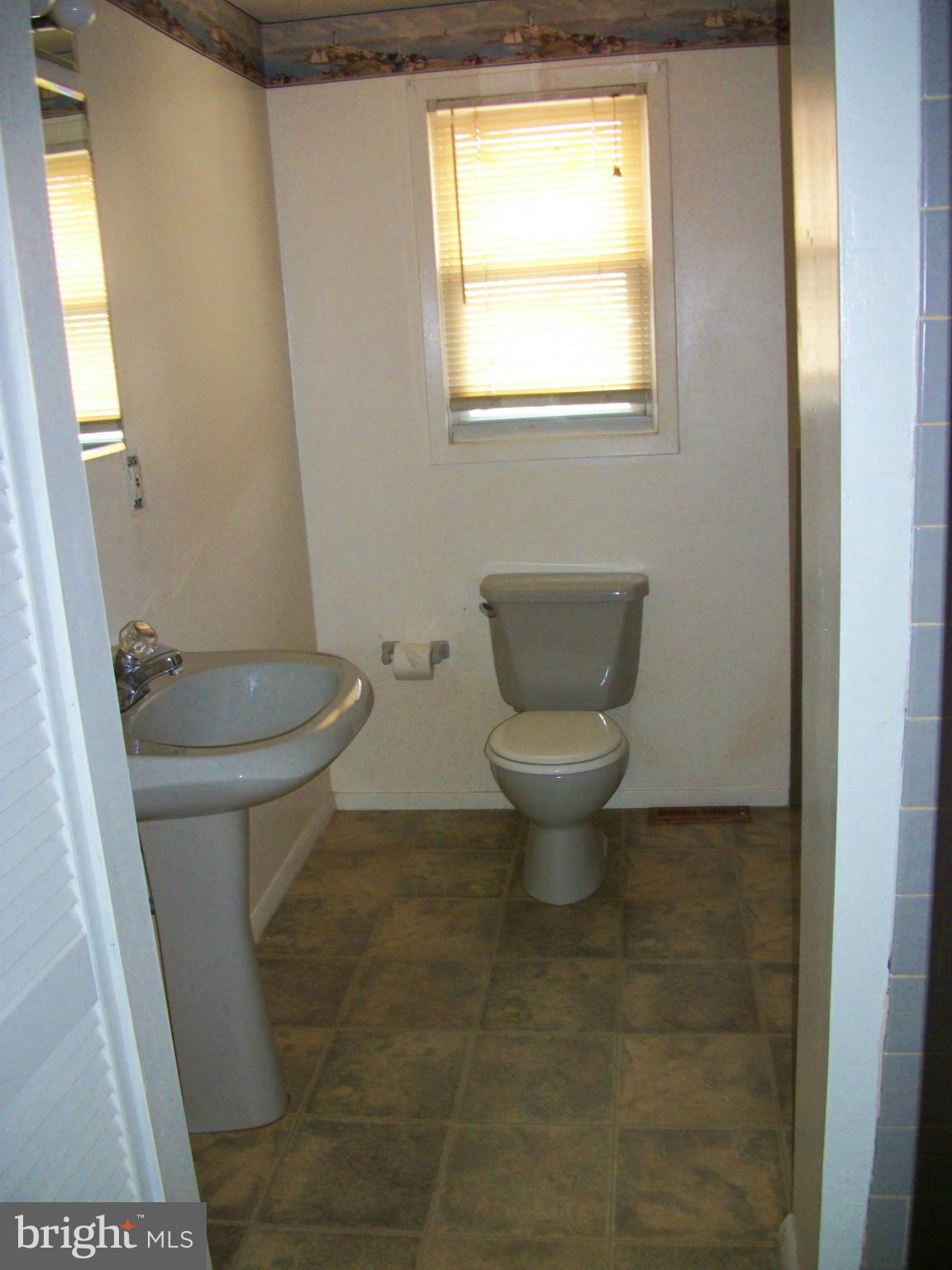 8573 Beacon Point Road Pasadena, MD 21122 - Photo 8 of 8 Full Bath on upper level w/sep shower & jetted tub