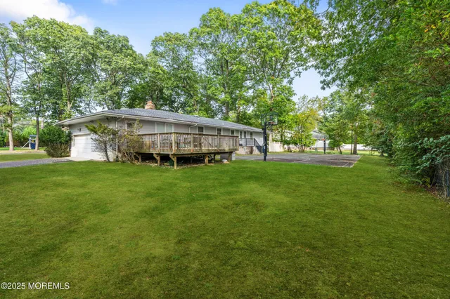 a view of a house with a big yard