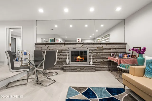 a lobby with a table and chairs