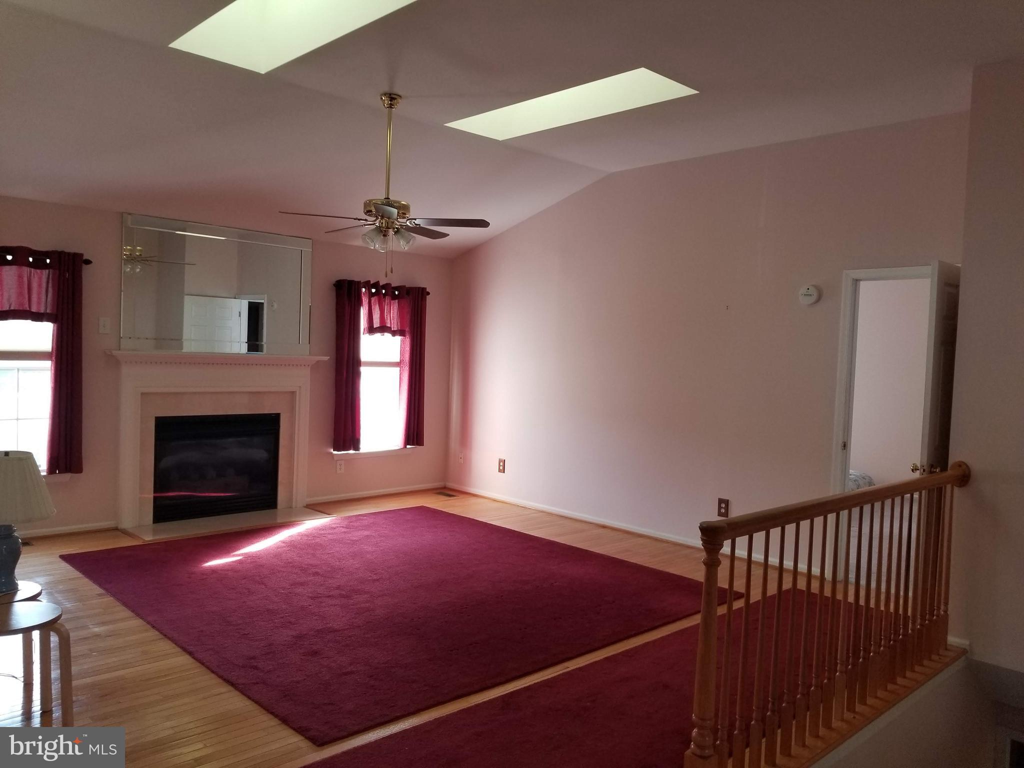 47 Raintree Drive Sicklerville, NJ 08081 - Photo 3 of 26 Living Room with Gas Fireplace