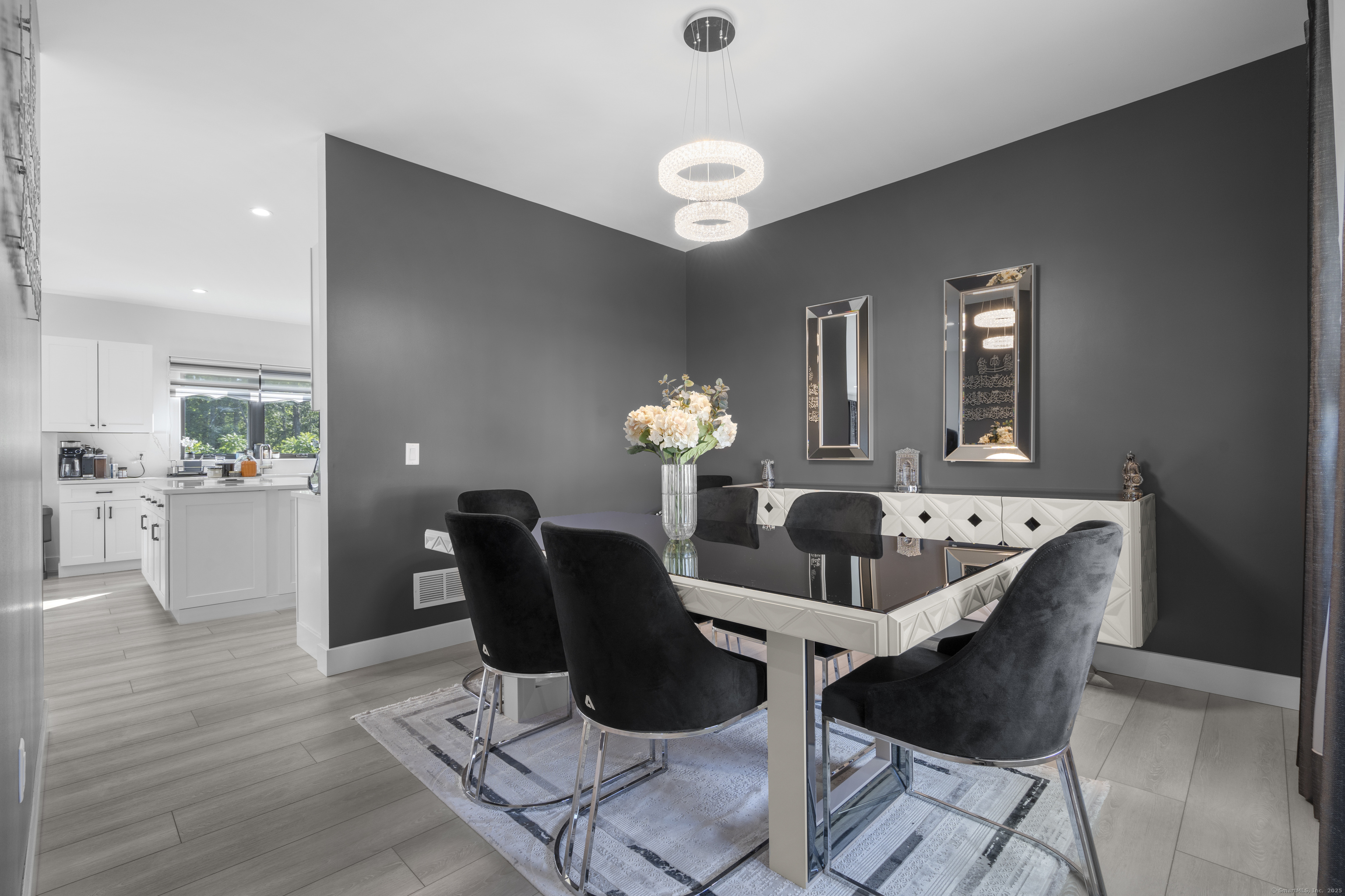 6 Vinnie Drive Wethersfield, CT 06109 - Photo 14 of 36 a dining room with furniture and chandelier
