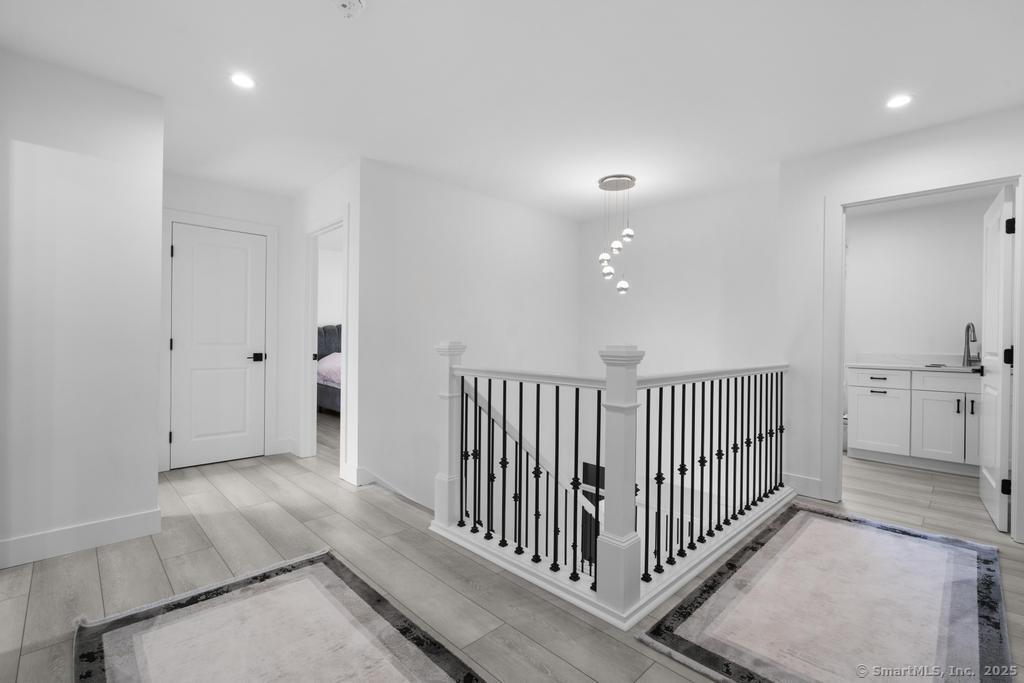 6 Vinnie Drive Wethersfield, CT 06109 - Photo 19 of 36 a view of a hallway