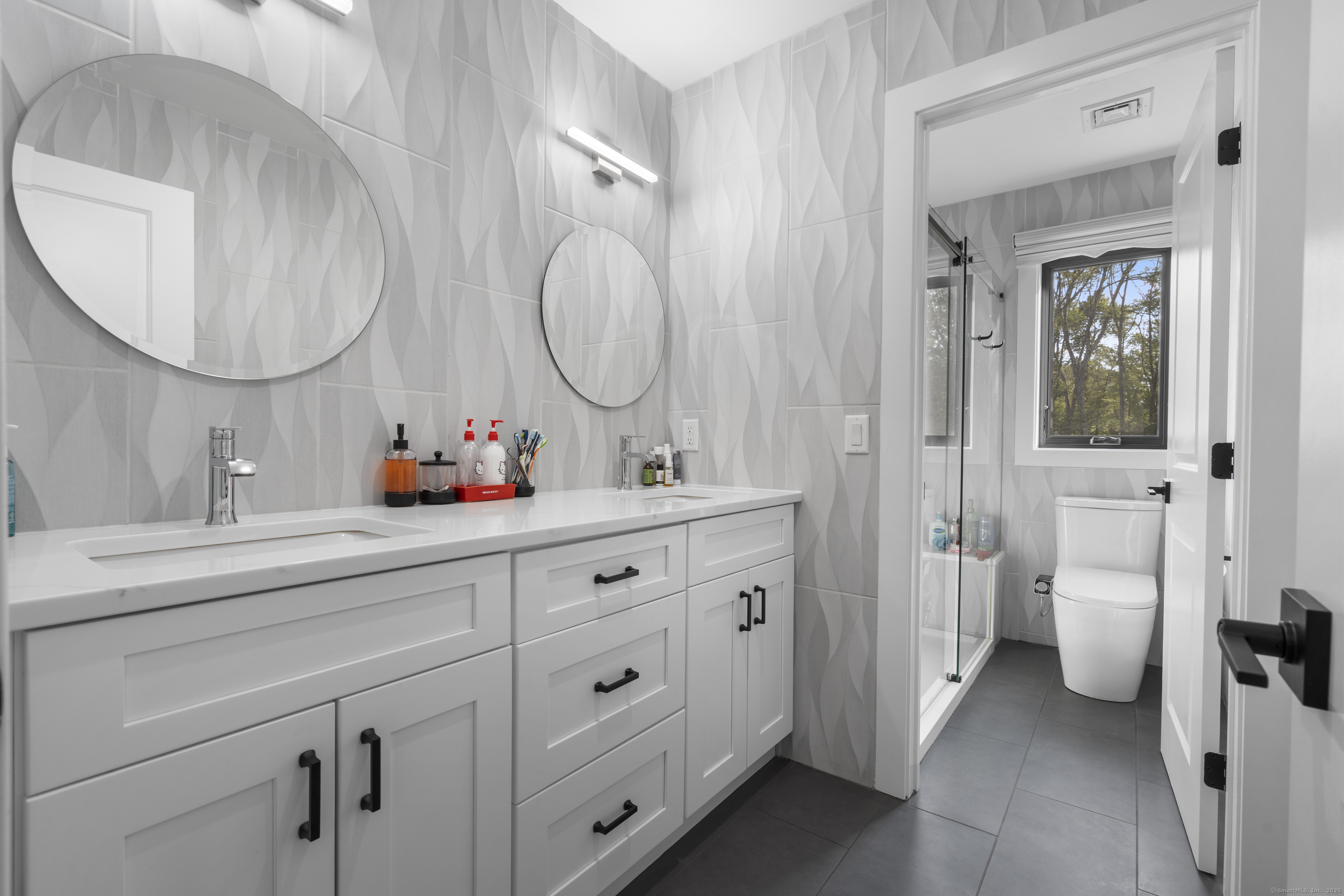6 Vinnie Drive Wethersfield, CT 06109 - Photo 25 of 36 a spacious bathroom with a double vanity sink mirror and toilet