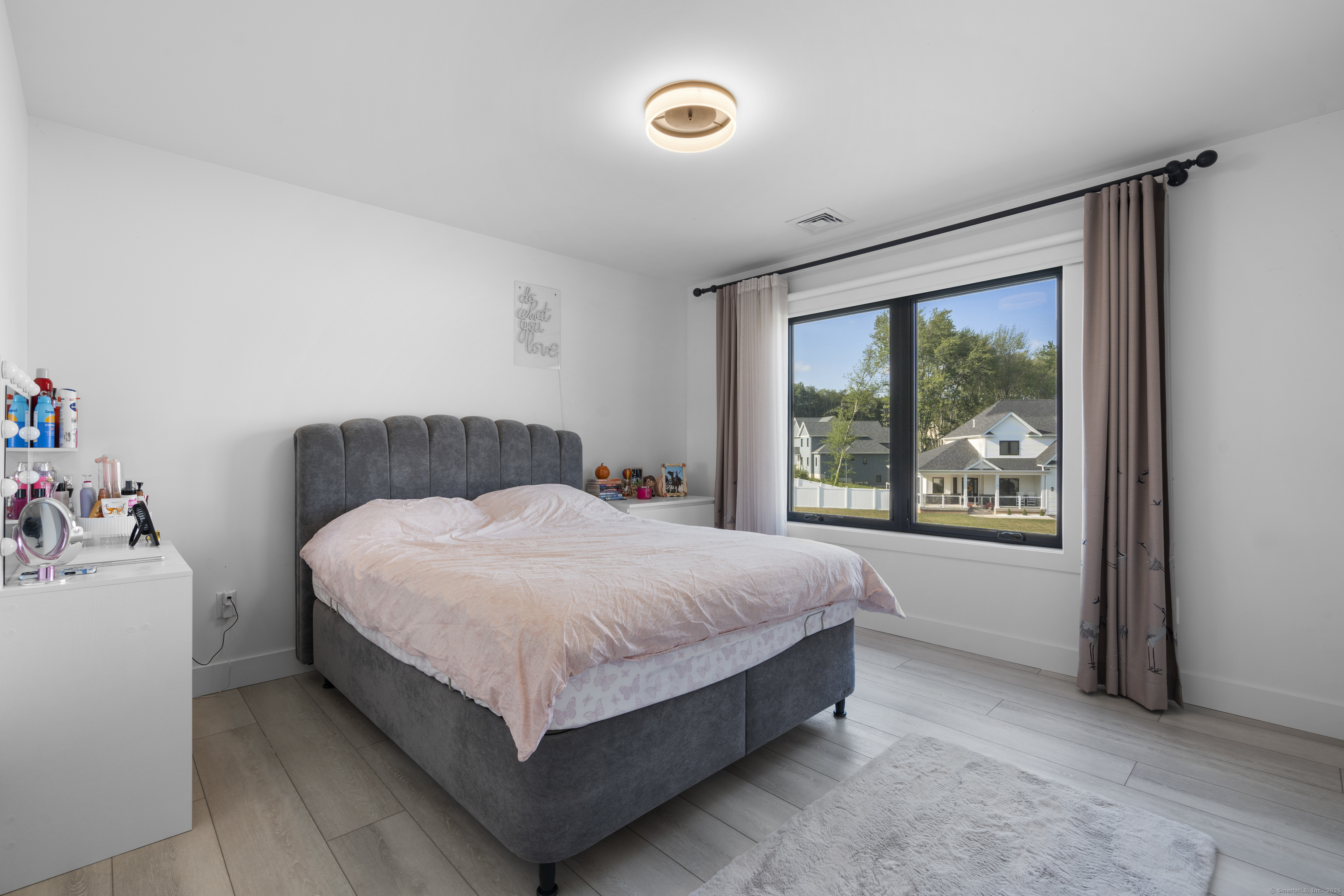 6 Vinnie Drive Wethersfield, CT 06109 - Photo 27 of 36 a bedroom with a bed and a window