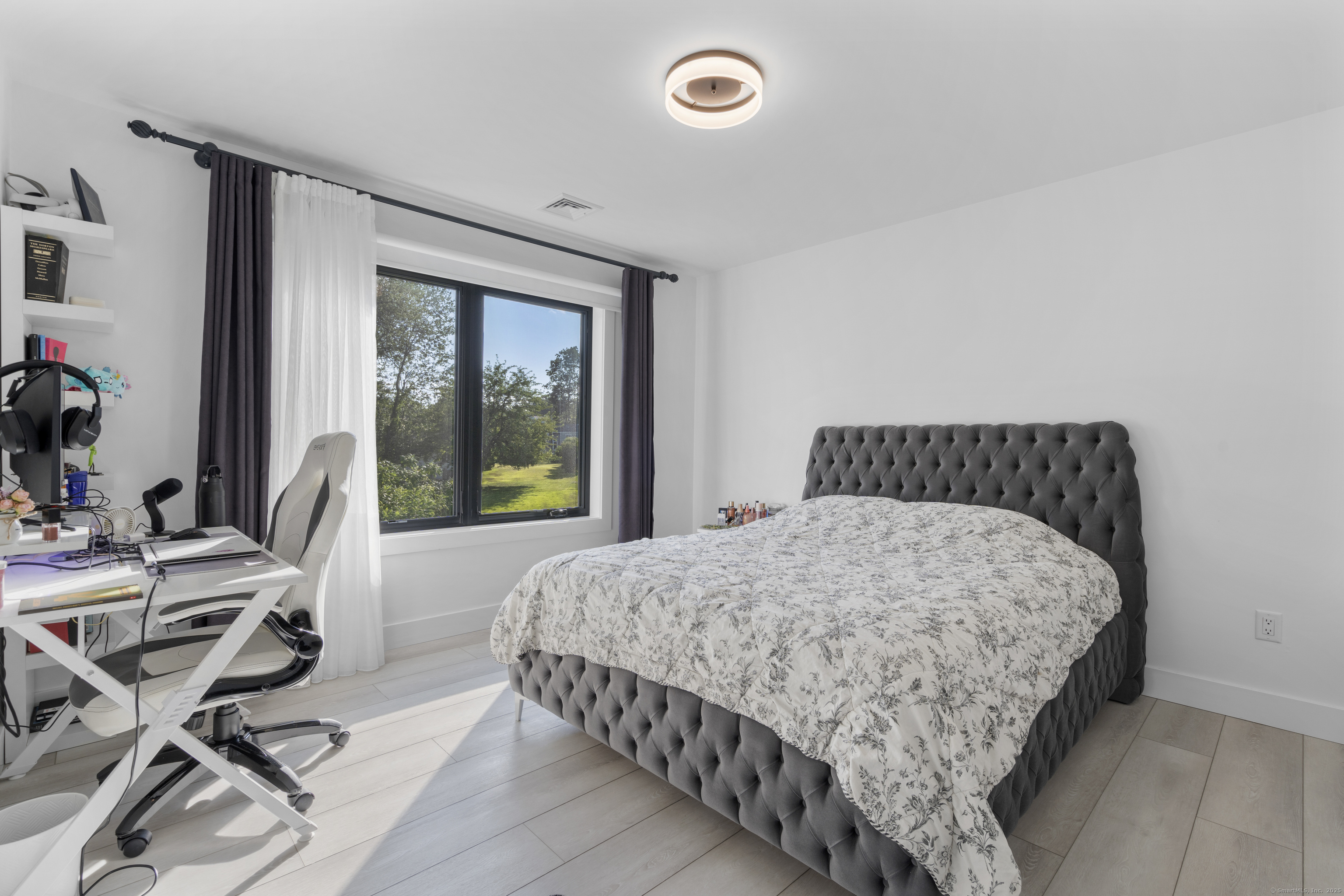 6 Vinnie Drive Wethersfield, CT 06109 - Photo 28 of 36 a bedroom with a bed and glass door