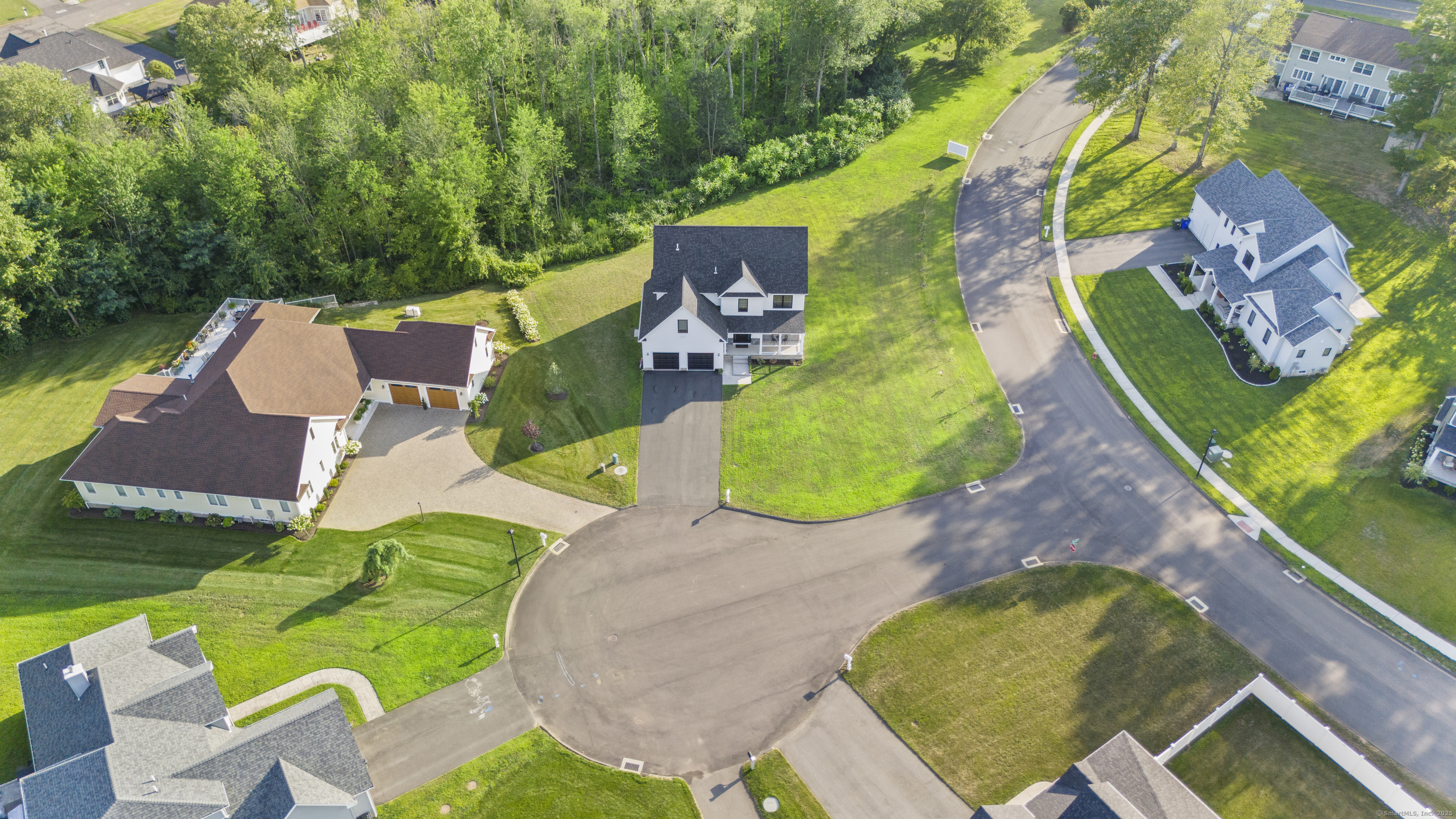 6 Vinnie Drive Wethersfield, CT 06109 - Photo 6 of 36 an aerial view of a house with a swimming pool and garden