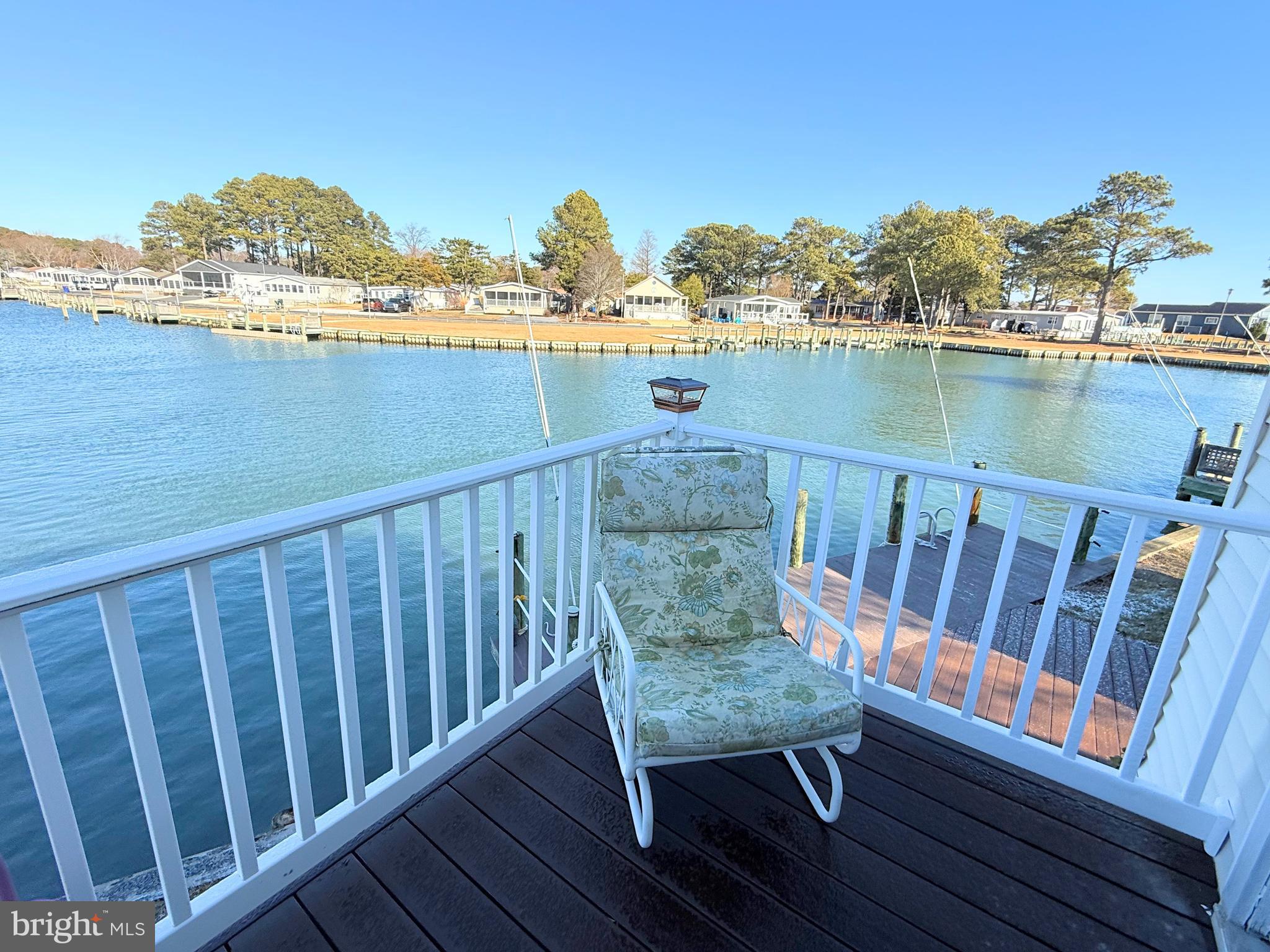 37097 Sandpiper Road, Unit 9 Long Neck, DE 19966 - Photo 17 of 54 cozy deck off the primary bedroom