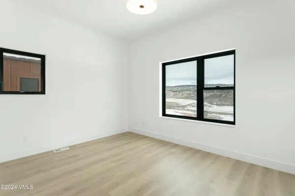 an empty room with windows
