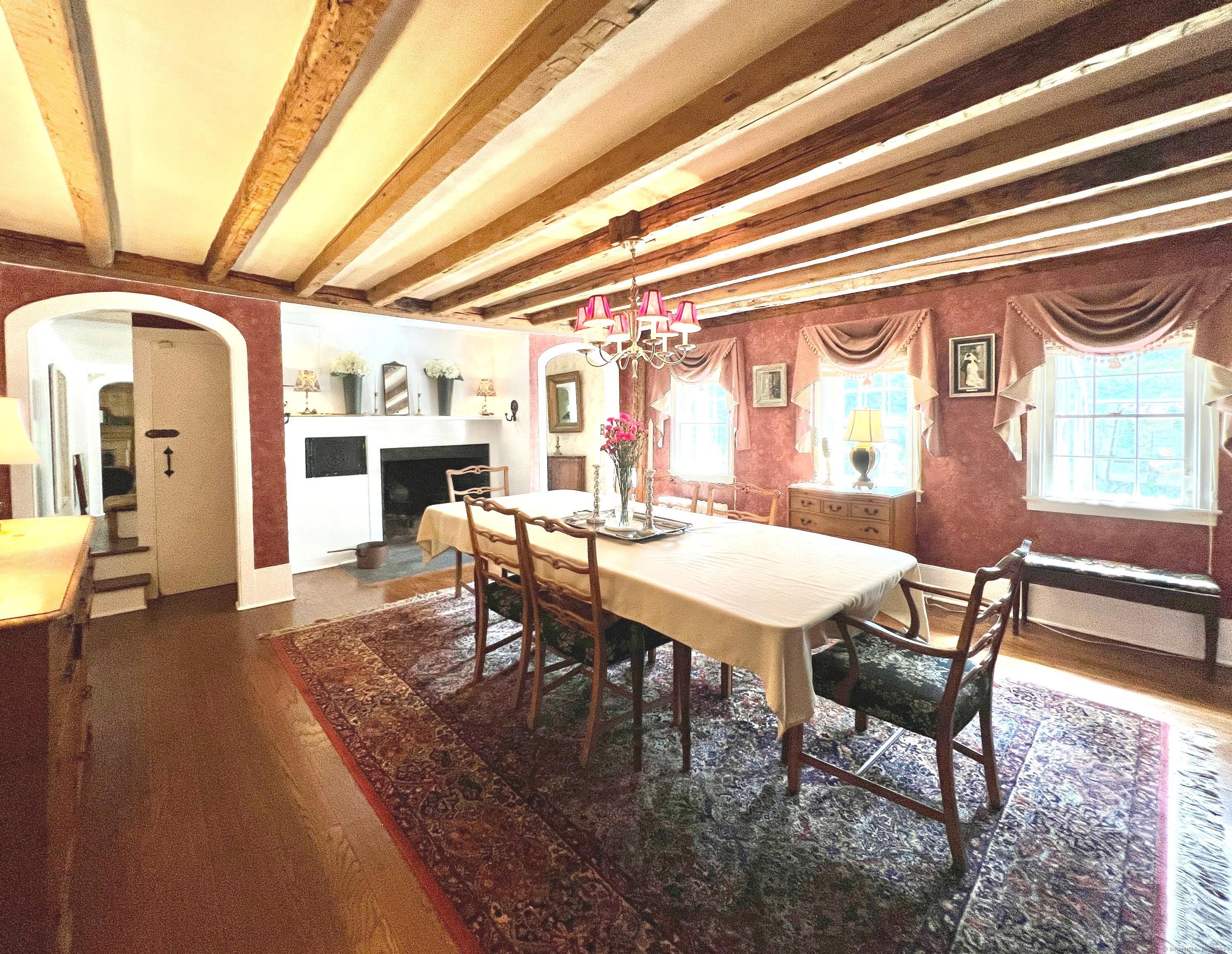 301 Haviland Road Stamford, CT 06903 - Photo 17 of 34 a view of a dining room with furniture window and wooden floor