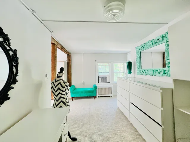 a bathroom with a sink a mirror and a bathtub