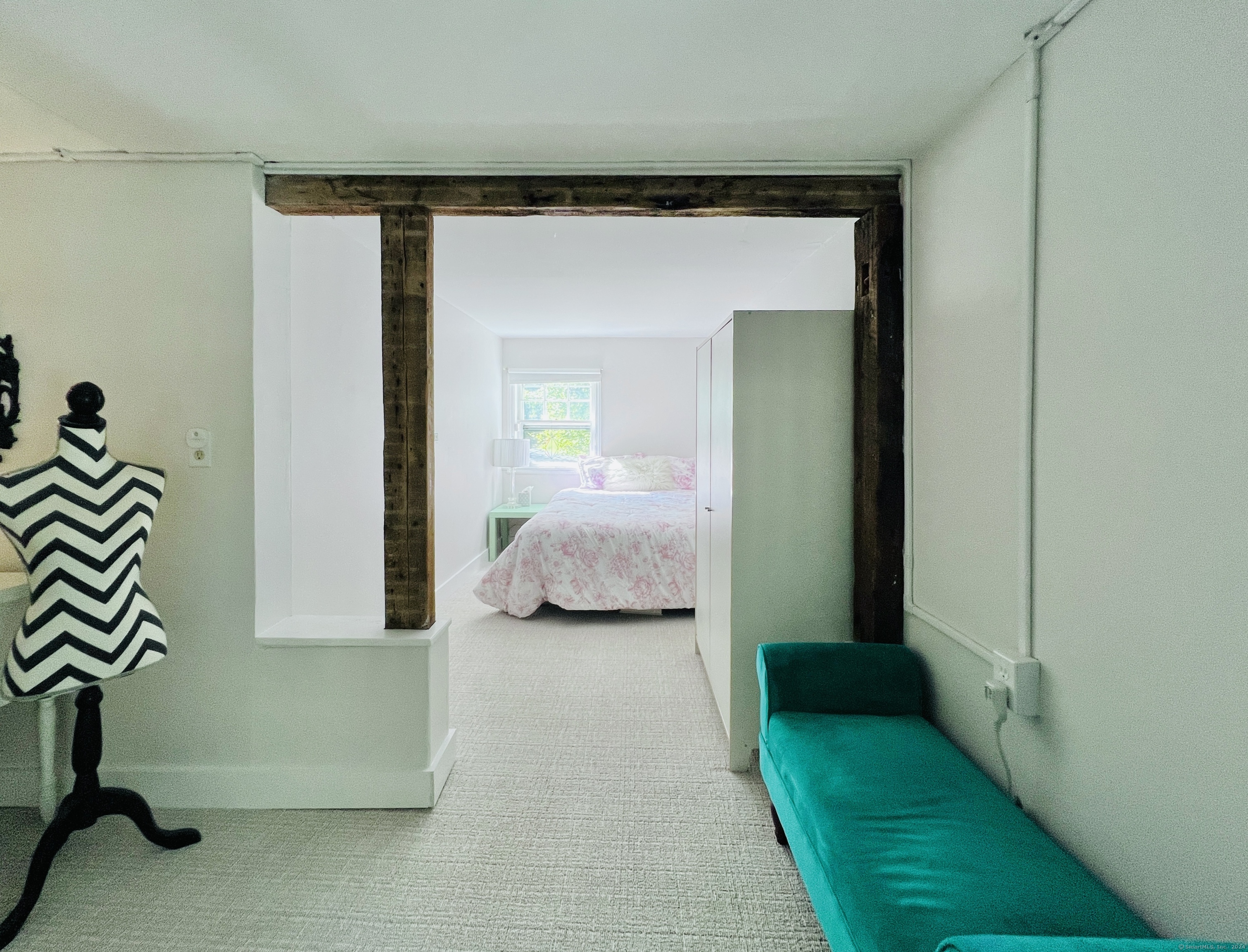 301 Haviland Road Stamford, CT 06903 - Photo 25 of 34 a bedroom with a bed and a mirror