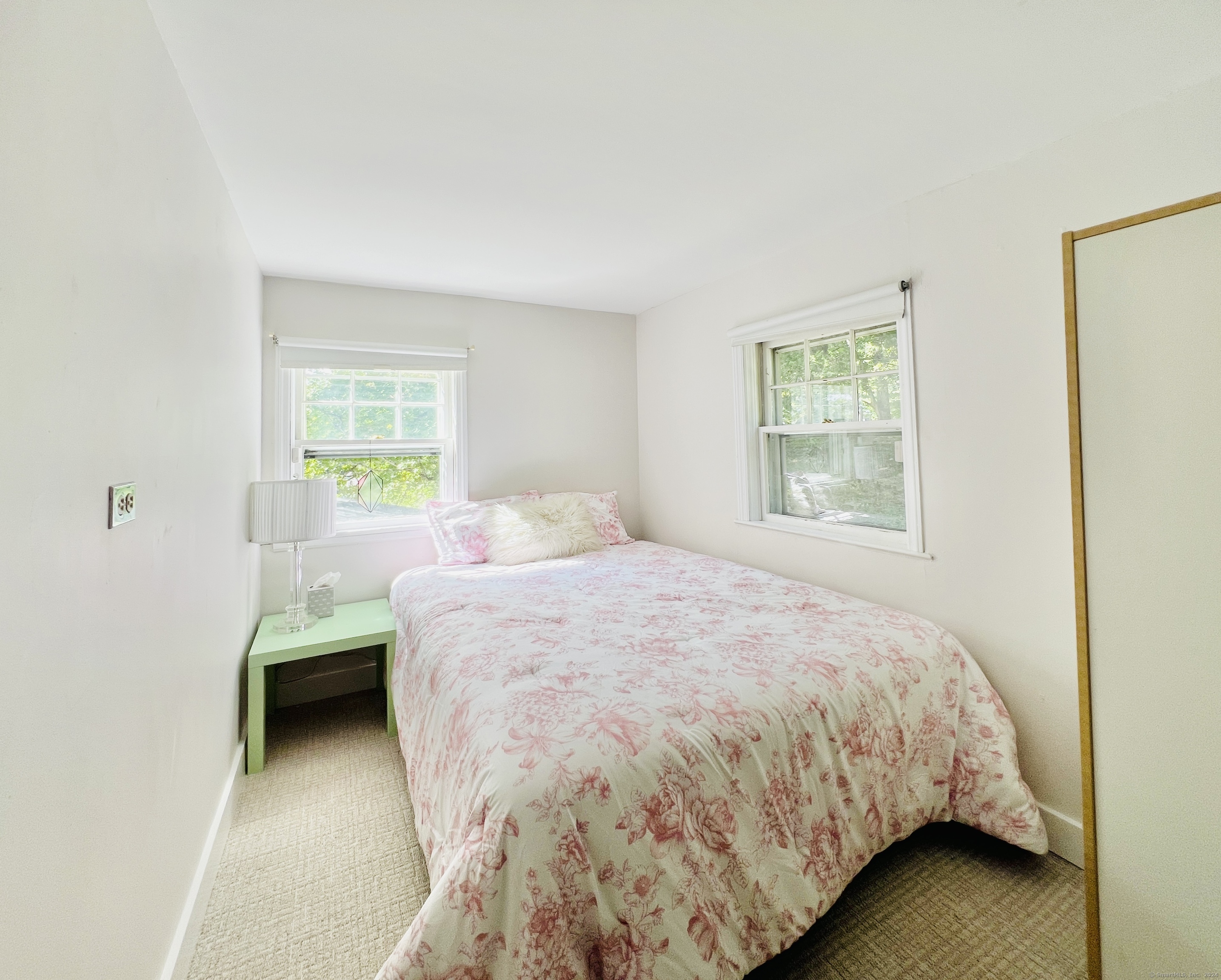 301 Haviland Road Stamford, CT 06903 - Photo 26 of 34 a bedroom with a bed and a window