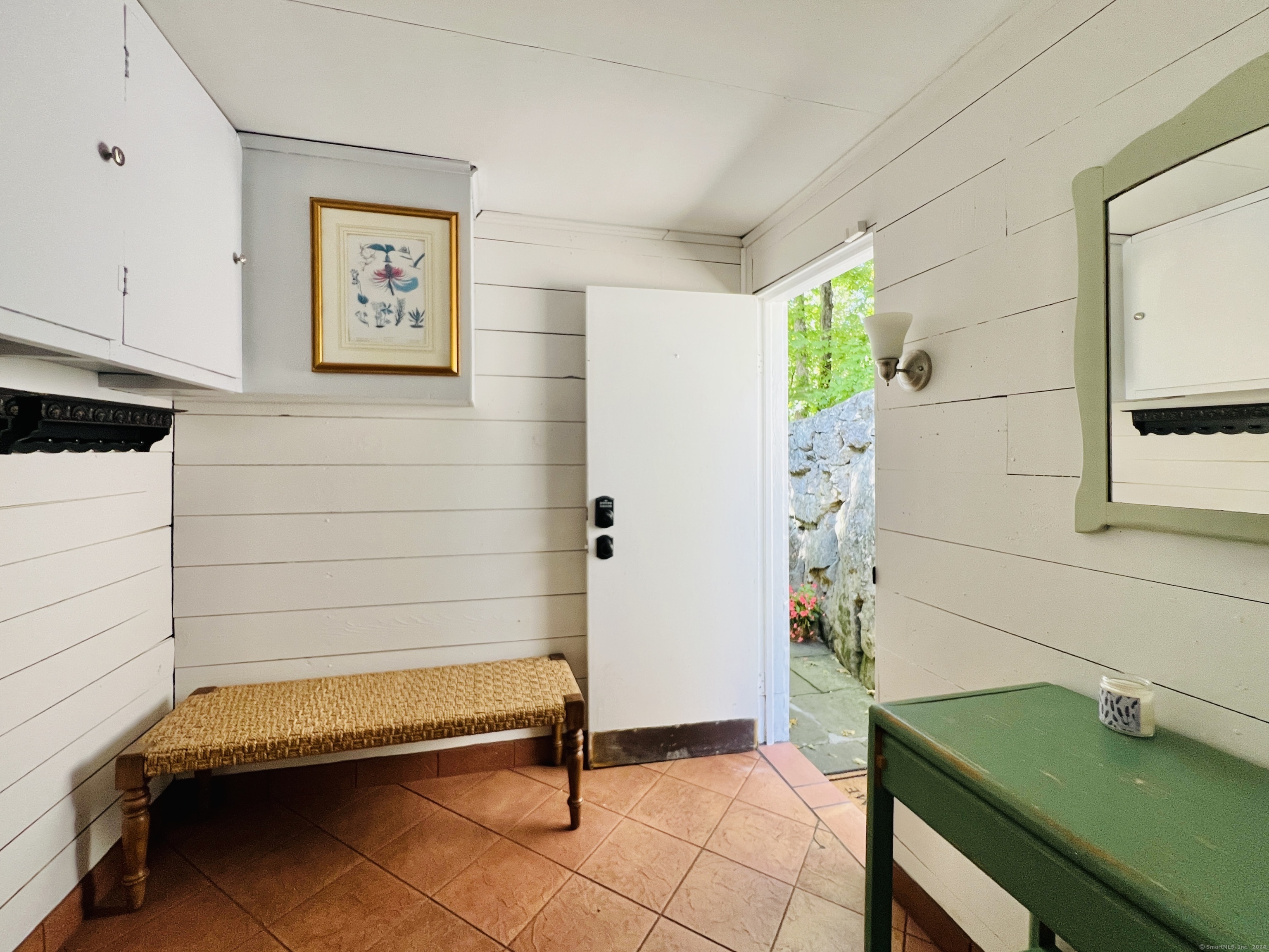 301 Haviland Road Stamford, CT 06903 - Photo 6 of 34 a bathroom with a sink and a mirror