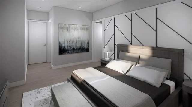 a living room with a bed and furniture