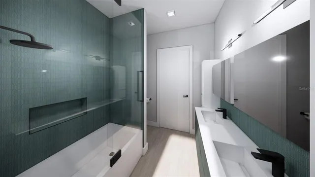 a bathroom with a sink and shower